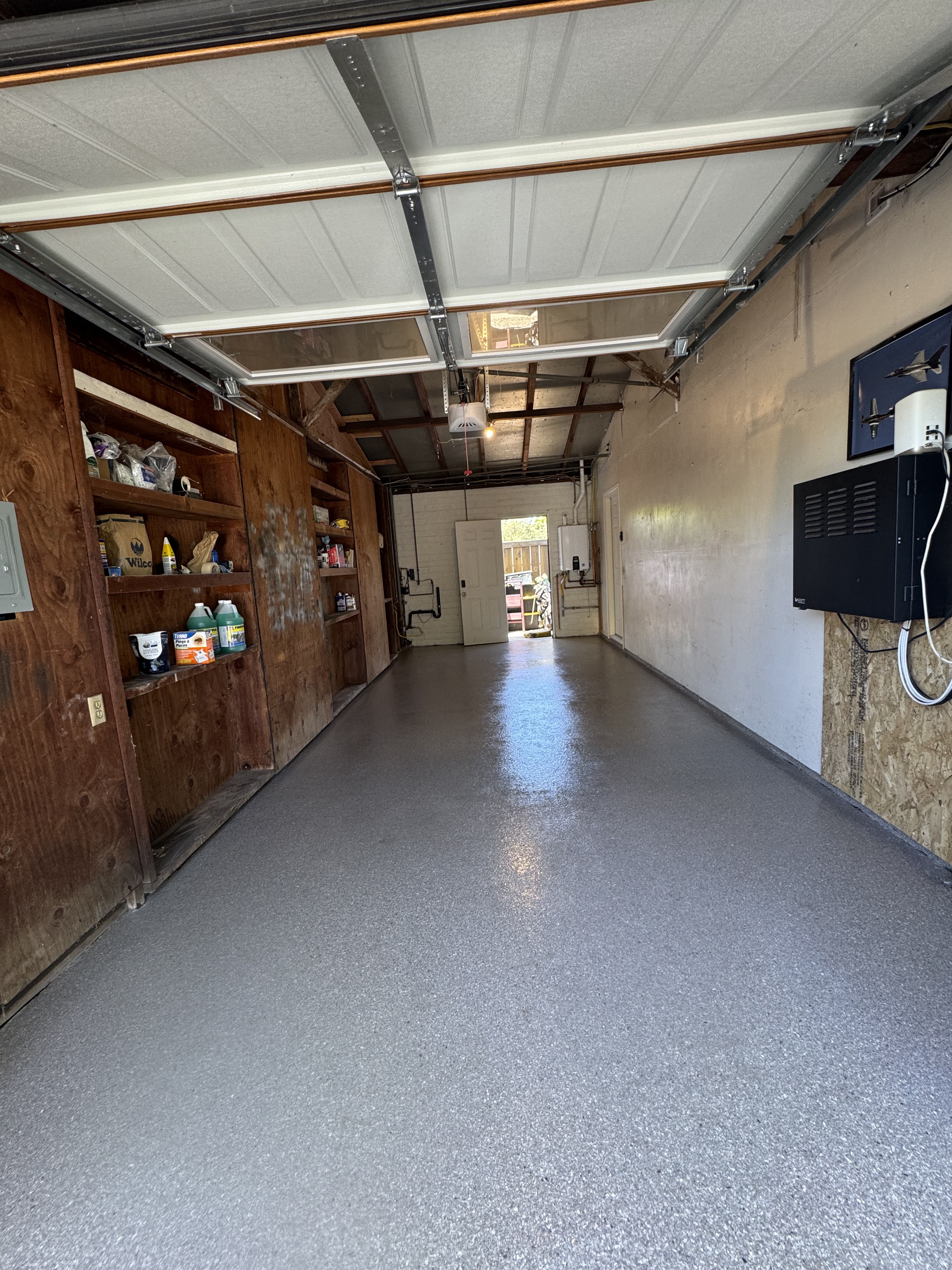 Flake polyaspartic garage floor installation